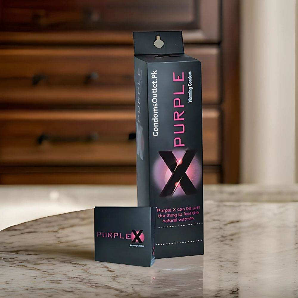 Dispenser box of Klimax Purple X Warming and Studded purple condoms - Pack of 36